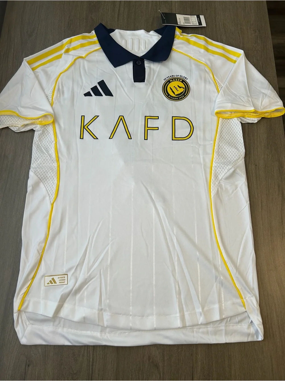 Al- Nassr adidas White, Yellow & Navy KAFD Men's Soccer Polo Jersey